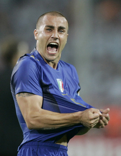 Mondiale 2006 (17).jpg - Italy's Fabio Cannavaro celebrates after their World Cup 2006 semi-final soccer match against Germany in Dortmund July 4, 2006.  FIFA RESTRICTION - NO MOBILE USE     REUTERS/Tony Gentile (GERMANY)